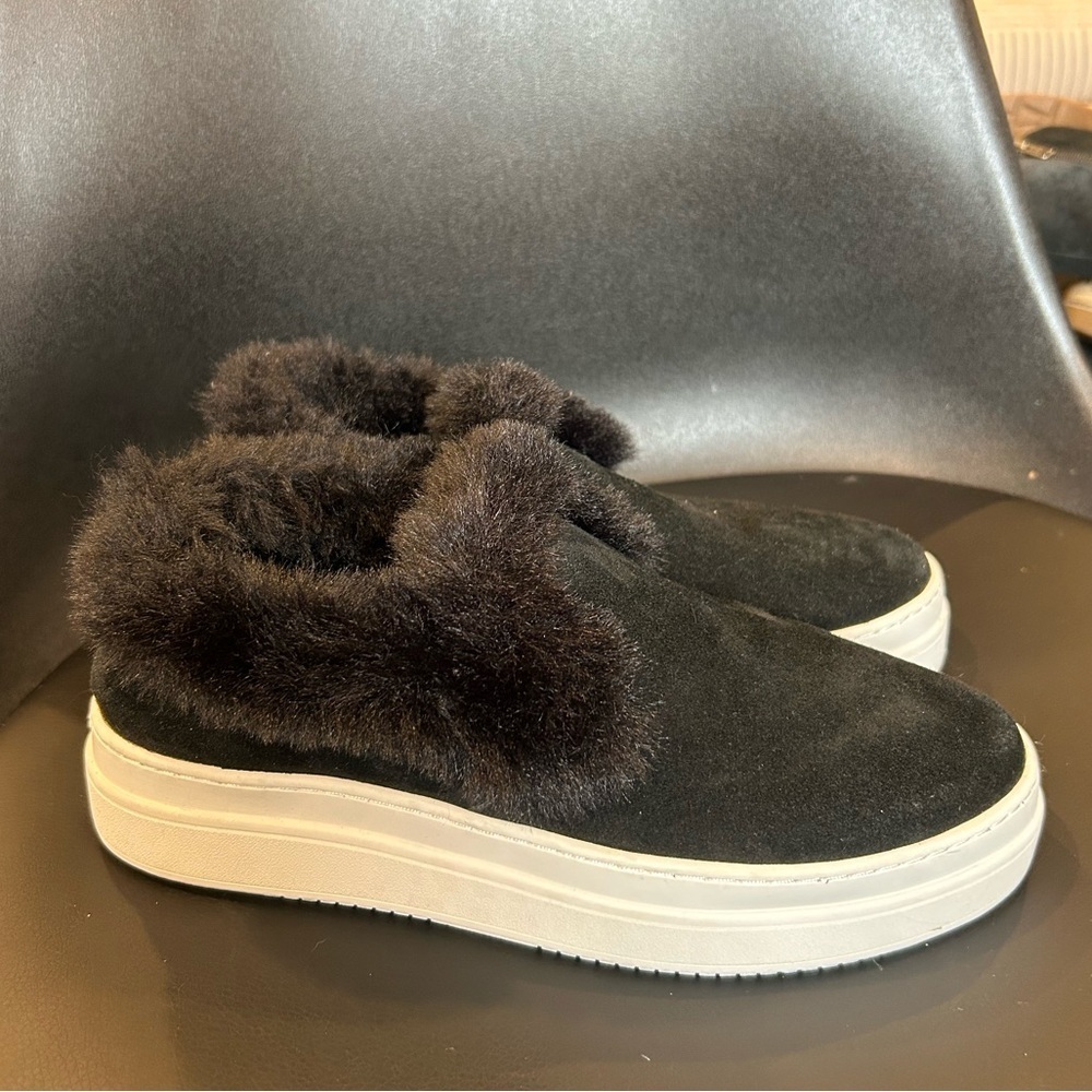 J/Slides! Womans black leather with faux fur trim. White platform. Size 8.